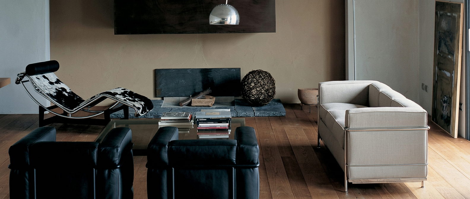 Wohnbereich mit Sofa und Sessel